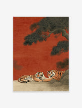 Two majestic tigers resting under a large pine tree against a red background in a traditional Japanese illustrative art print.