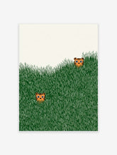 Two cute illustrated tiger heads peeking from tall green grass on a light cream background, playful tiger wall art print.