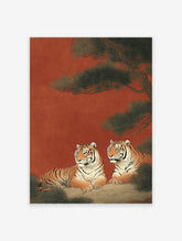 Two majestic tigers resting under a green pine tree against a reddish-brown background in a traditional Japanese tiger wall art print.