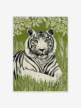 Linocut-style tiger wall art print with green eyes, black stripes, and white fur, against a green jungle background