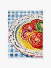 Vibrant oil painting print of sliced red, orange, and green tomatoes on a white plate with yellow dressing and blue checkered tablecloth.