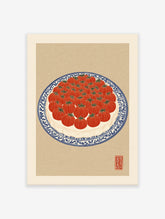 Illustration of red tomatoes arranged on a blue and white patterned plate, presented as a vibrant tomato wall art print.