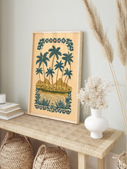 Illustrative tropical beach scene with blue palm trees, brown mountains, water, and, in an alternate framed mockup
