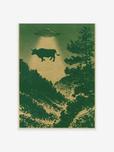 Surreal UFO abduction scene with a cow floating above a dark green forest, illustrated poster print