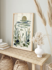 Underwater diver art print in watercolour style with green and blue marine plants and a muted, in an alternate framed mockup