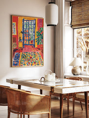 Vibrant interior room poster with a blue open window, green plants in pots, red walls, yellow curtains, and a colorful floral rug. - Image 2