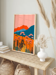 Vibrant landscape wall art with orange fields, pink flowering trees, and teal mountains under a pink sky in an illustrative style. - Image 3