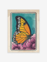 Vintage butterfly wall art print featuring an orange butterfly on a pink flower against a teal background with halftone texture.