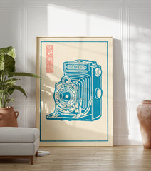 Blue vintage folding camera illustration art print with a red Japanese seal on a cream background within a blue border. - Image 3