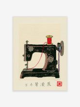 Vintage black sewing machine illustration with red thread spool and Japanese text on cream background
