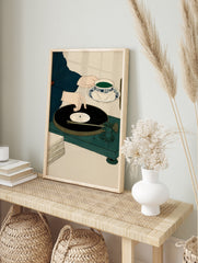 Minimalist illustration of a person handling a vinyl record on a turntable while holding a, in an alternate framed mockup