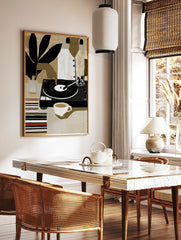 Modern illustrative wall art of a person with a vinyl record player, coffee, and plant leaves, in, in a styled room mockup