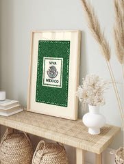 Viva Mexico wall art with Mexican eagle and snake emblem, 'VIVA MEXICO' text, green textured, in an alternate framed mockup