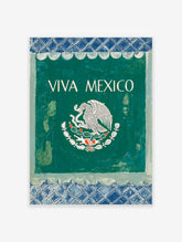 VIVA MEXICO wall art with white text and Mexican eagle emblem on dark green, framed by blue patterned borders