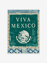 Viva Mexico wall art with white text and Mexican national emblem of eagle and snake on teal background, folk art border