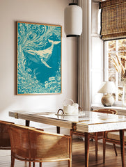 Illustrative whale swimming through swirling floral currents in teal and cream, nature-inspired, in a styled room mockup