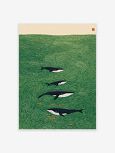 Illustrated whale art print showing a family of whales and small fish swimming in a green ocean with stylized waves.
