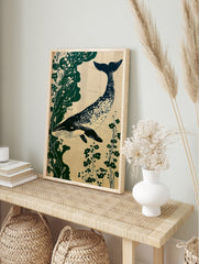 Whale and botanical illustration in Japanese style, deep blue whale with green plants on a, in an alternate framed mockup
