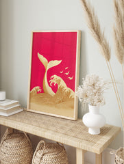 Illustrative whale tail emerging from ocean waves with birds on magenta background, in an alternate framed mockup