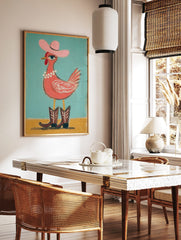 Whimsical chicken wearing pink cowboy hat, pearl necklace, and brown boots on teal and yellow, in a styled room mockup