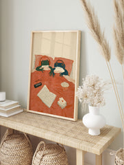 Illustrated frog art print of two frogs in bed with headphones, remote, book, and popcorn, enjoying a cozy night in. - Image 3