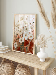 White anemone flowers with rust-coloured grasses and autumn leaves in a botanical, in an alternate framed mockup