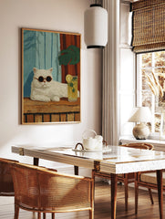 Illustrative white cat with round sunglasses, lemonade, blue and red striped background, green leaf, in a styled room mockup