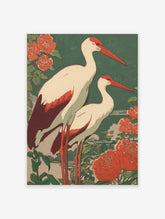Illustrative print of two white ibises with red heads, beaks, and legs, amidst red flowers and green leaves on a teal