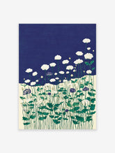 Illustrative botanical wall art print with white ranunculus flowers, green stems, and dark blue accent flowers on a navy background.