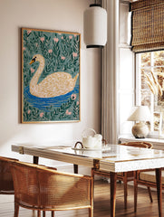 Illustrative white swan with orange beak swimming in blue water, surrounded by green leaves and, in a styled room mockup
