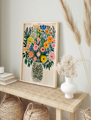 Colourful wildflower bouquet painting in a patterned vase on white background, in an alternate framed mockup