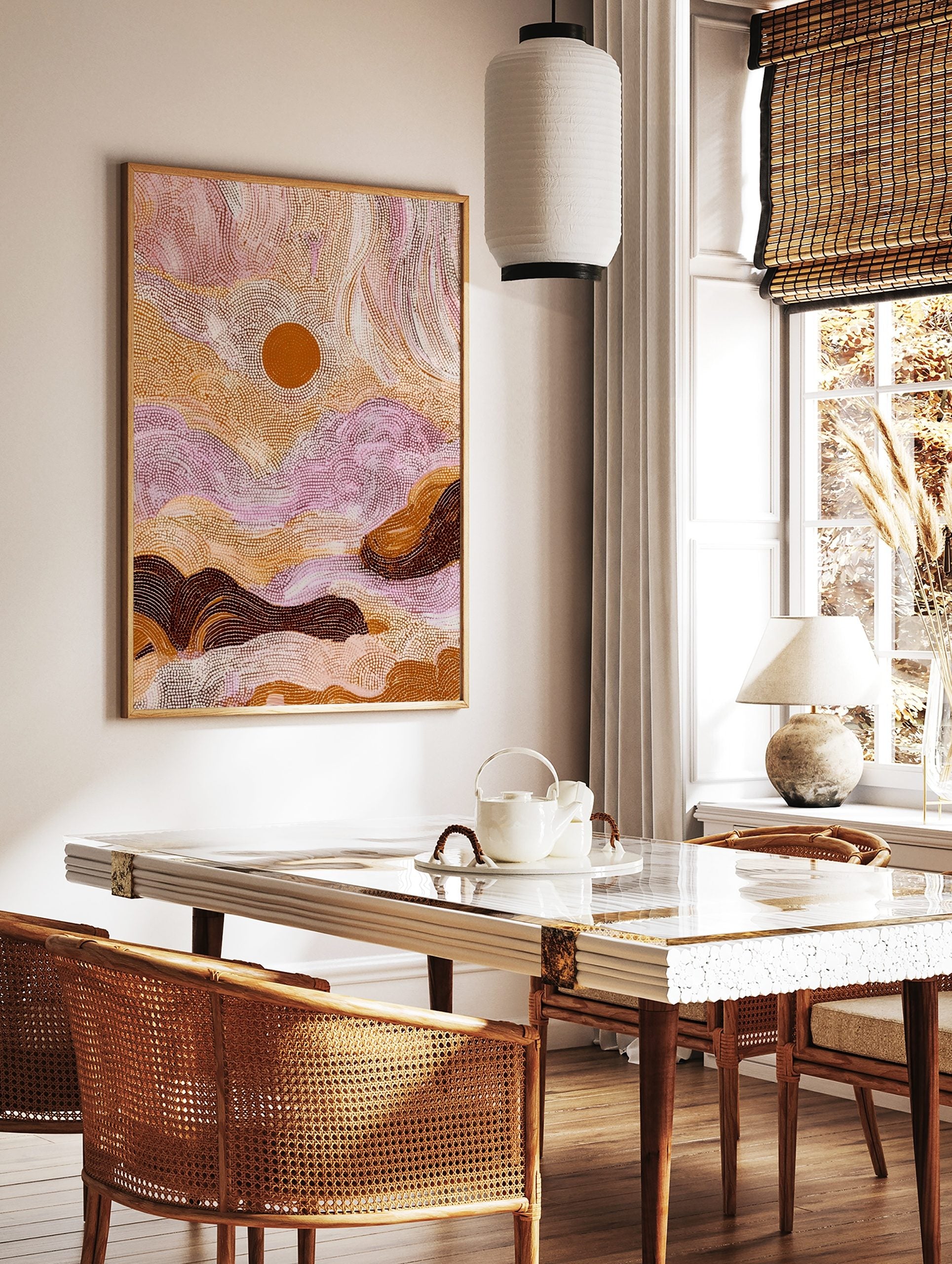 Aboriginal dot painting of an abstract desert landscape with a central sun, in earthy browns, in a styled room mockup