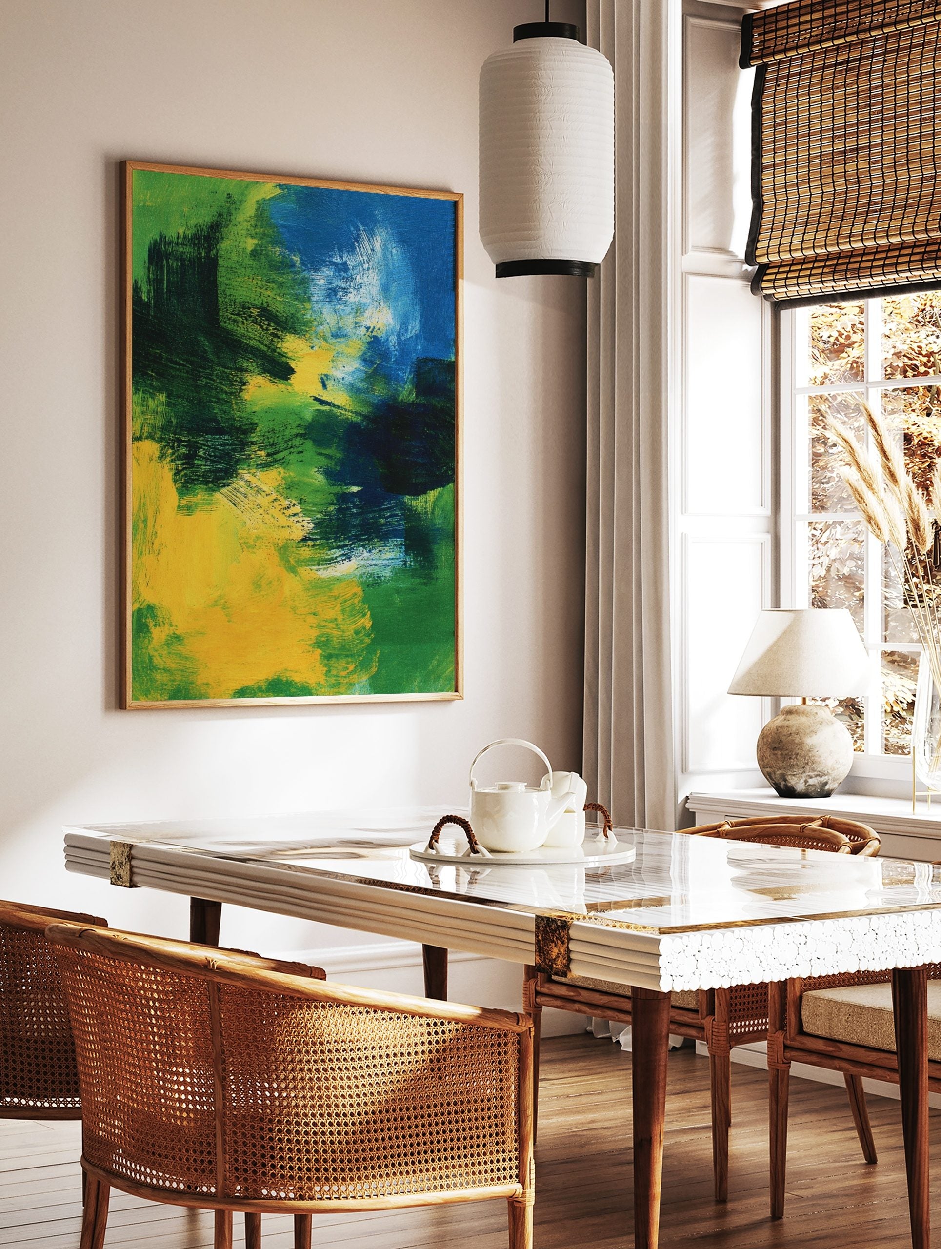 Abstract painting with bold brushstrokes in shades of blue, green, and yellow, creating dynamic, in a styled room mockup