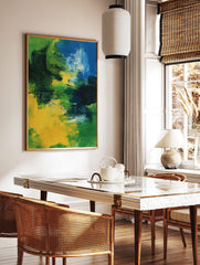 Abstract painting with bold brushstrokes in shades of blue, green, and yellow, creating dynamic, in a styled room mockup