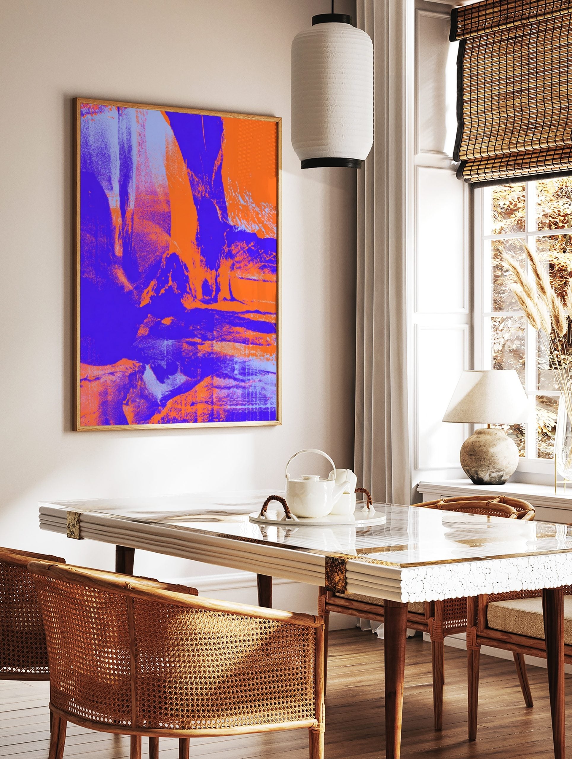 Abstract art print with distressed textures in bold orange, deep purple, and light blue hues, in a styled room mockup