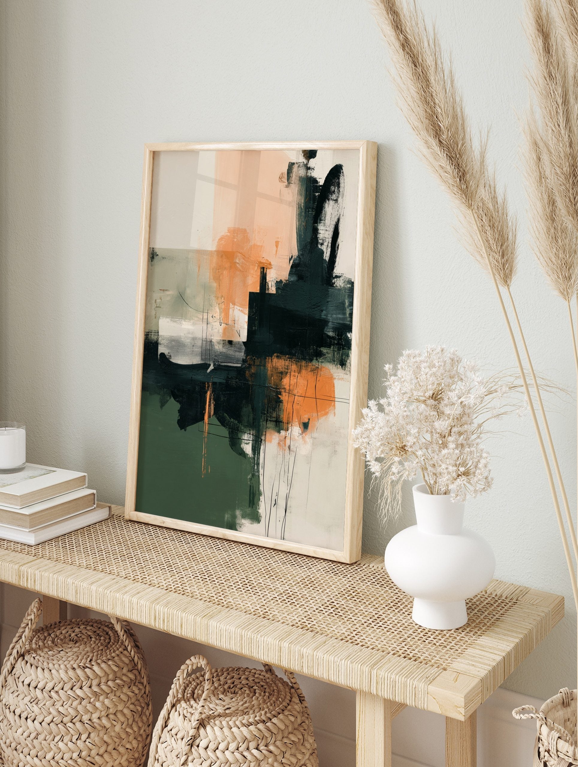 Abstract art print with blocks of dark green, peach, and charcoal, textured brushstrokes, and, in an alternate framed mockup