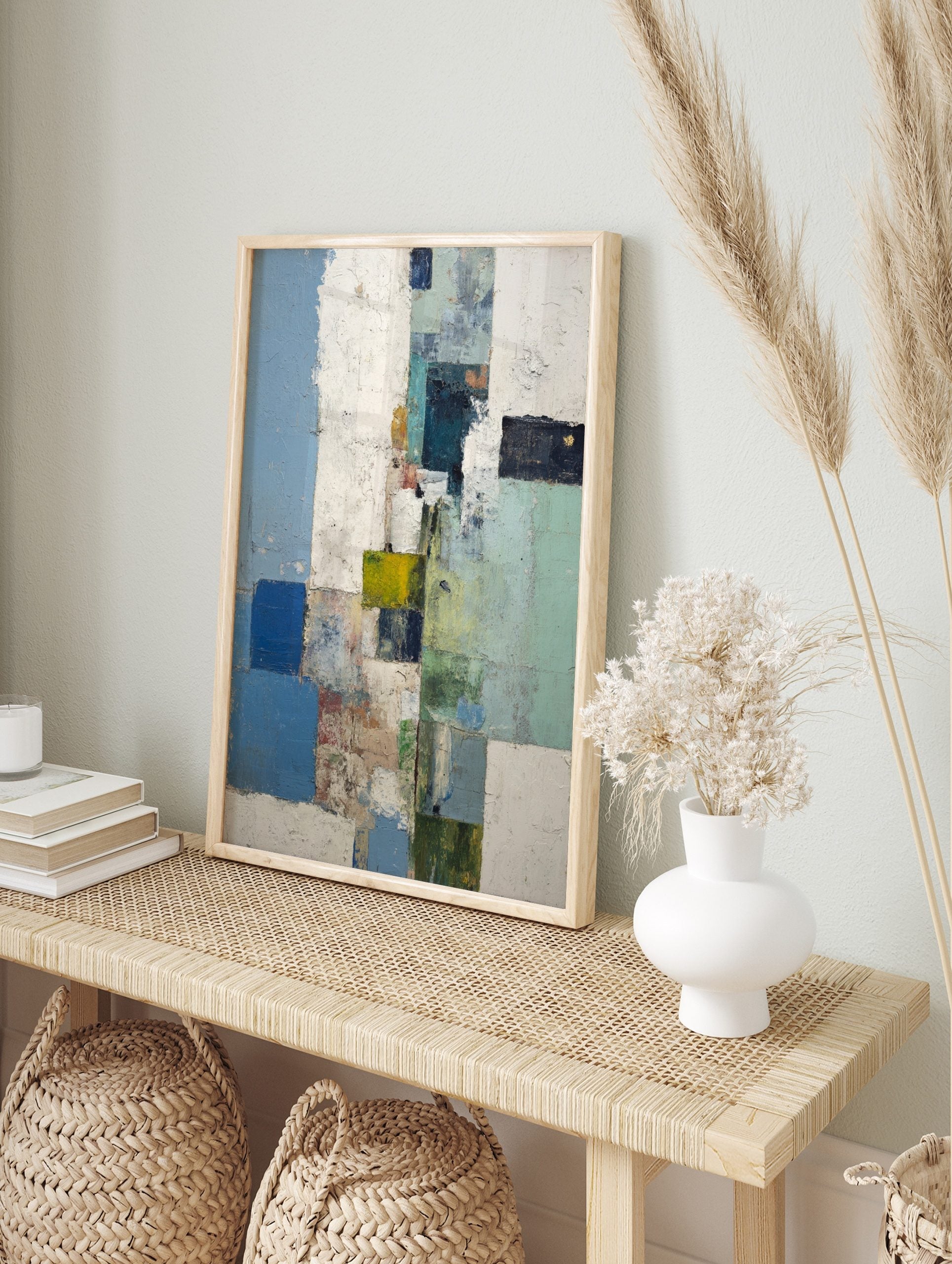 Abstract blocks wall art with textured blue, green, white, and yellow rectangular shapes in a, in an alternate framed mockup