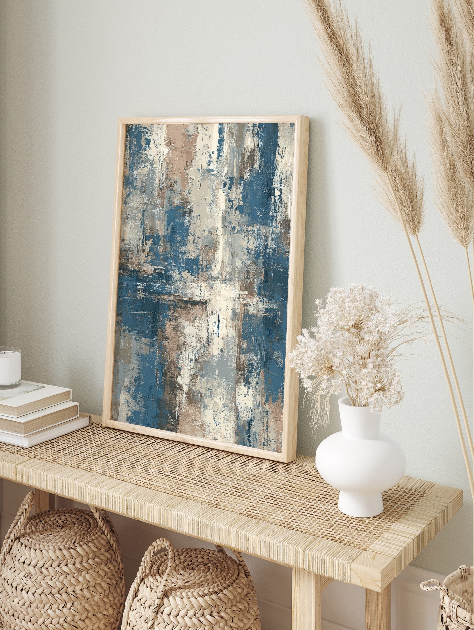 Abstract textured wall art print with layered blue, beige, and off-white brushstrokes in a, in an alternate framed mockup