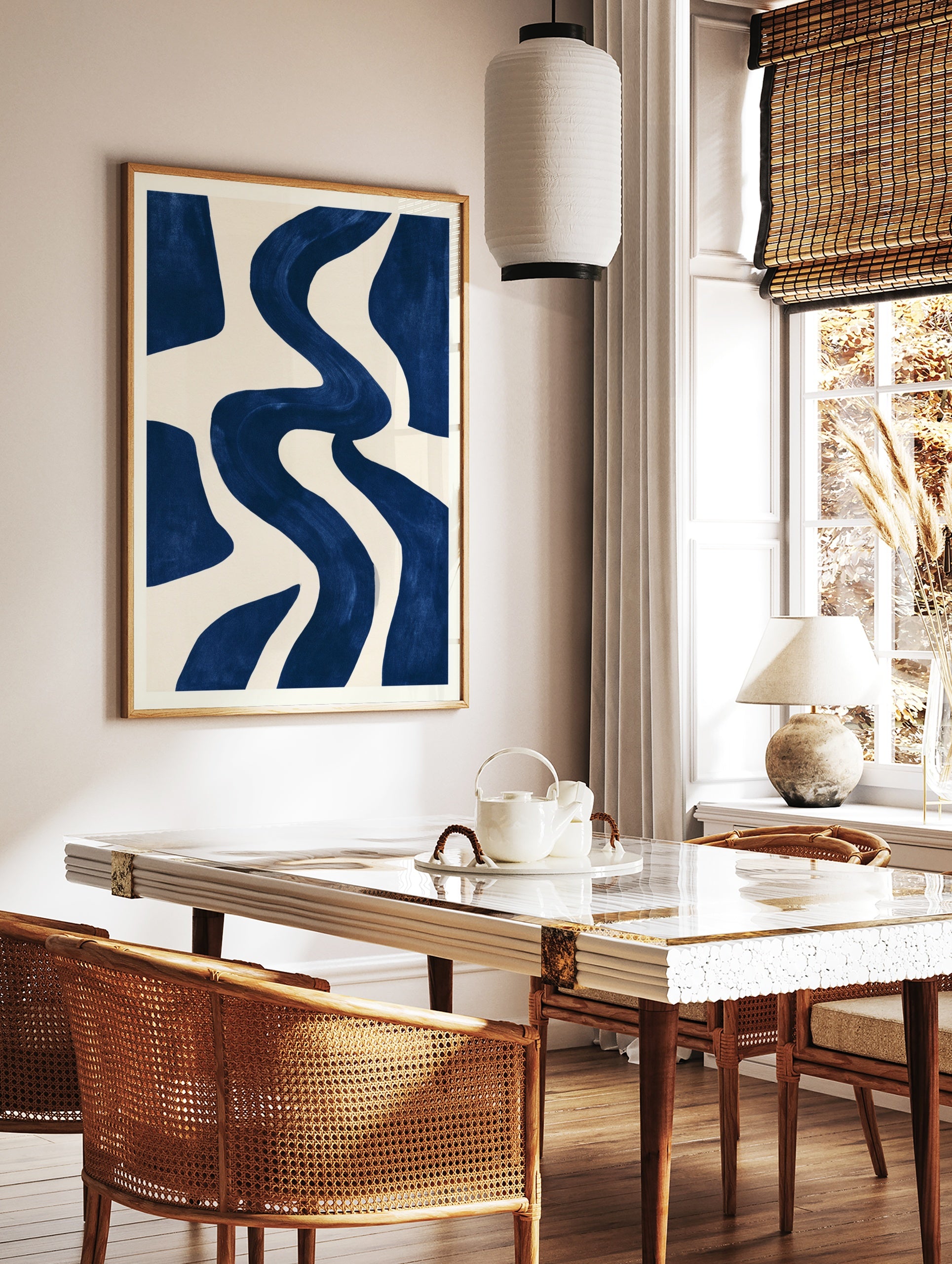 Abstract navy blue wavy shapes on a cream background, minimalist wall art print, in a styled room mockup