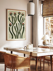 Abstract botanical illustration with green curving striped stems and red flower buds on a cream, in a styled room mockup