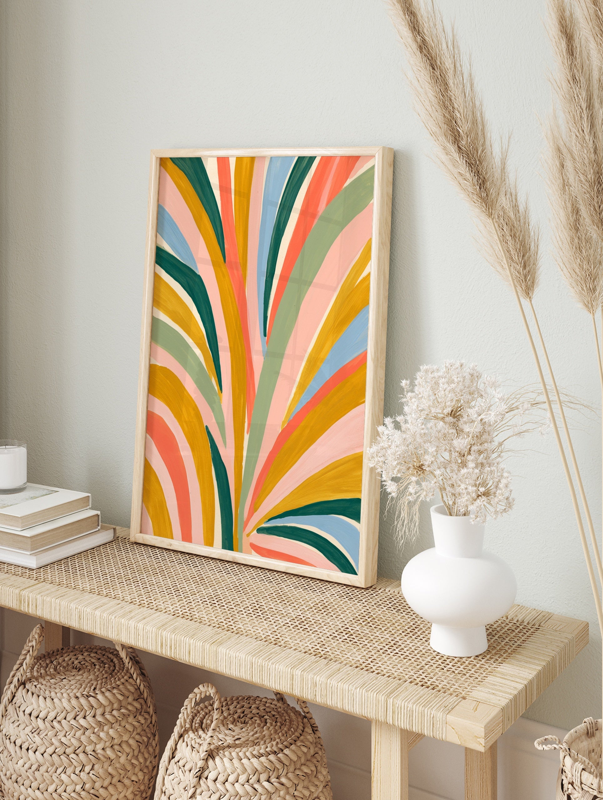 Abstract botanical art print with colourful painted leaf shapes in mustard, green, pink, and, in an alternate framed mockup