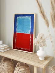 Abstract art print with a light blue rectangle over a red block, framed by dark blue and red, in an alternate framed mockup