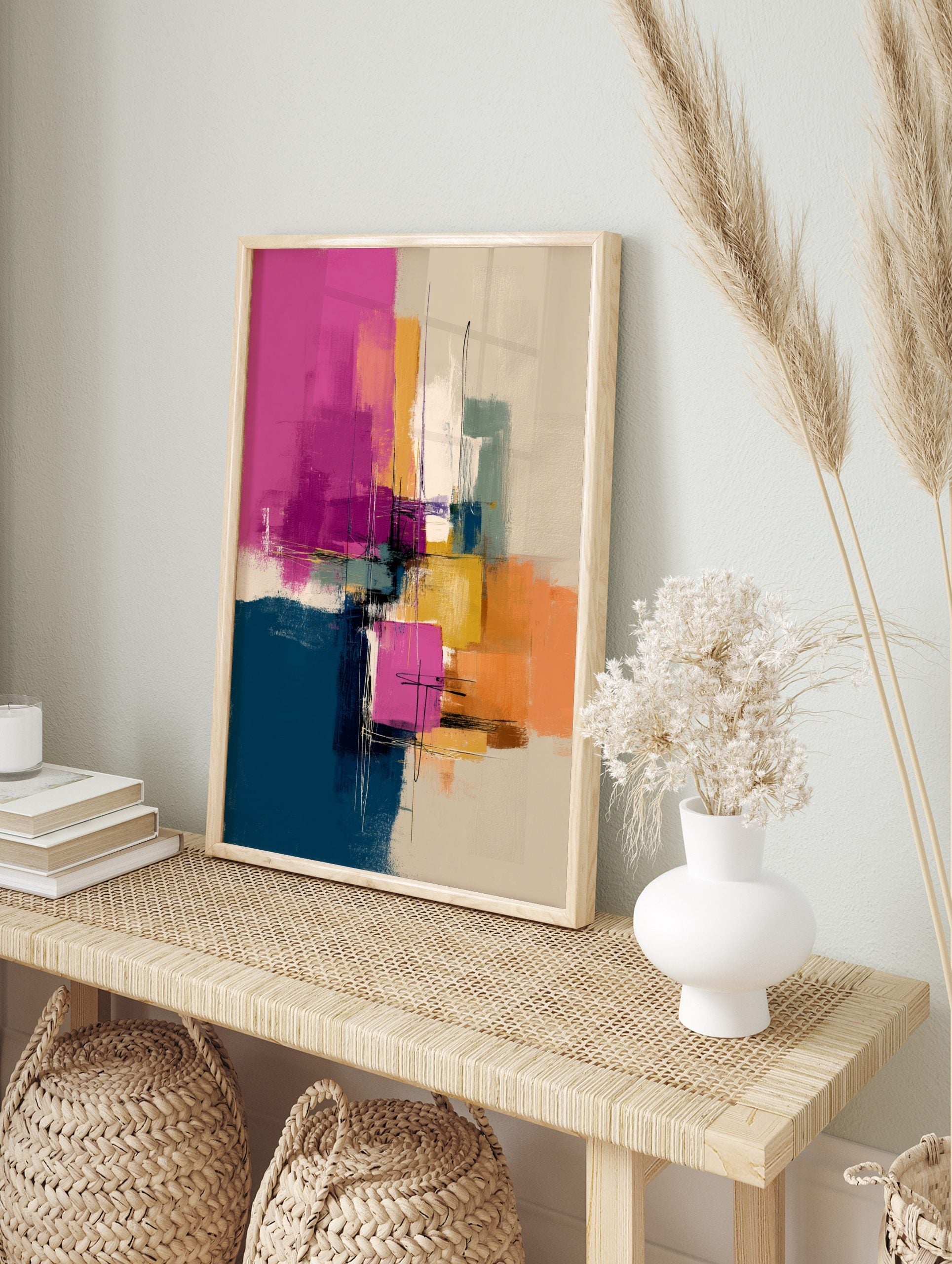 Abstract art print with pink, blue, yellow, orange brushstrokes and fine lines on a neutral, in an alternate framed mockup