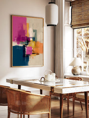 Abstract art print with pink, blue, yellow, orange brushstrokes and fine lines on a neutral, in a styled room mockup