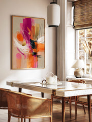 Abstract expressionist art print with fuchsia, orange, gold, and white brushstrokes and lines, in a styled room mockup