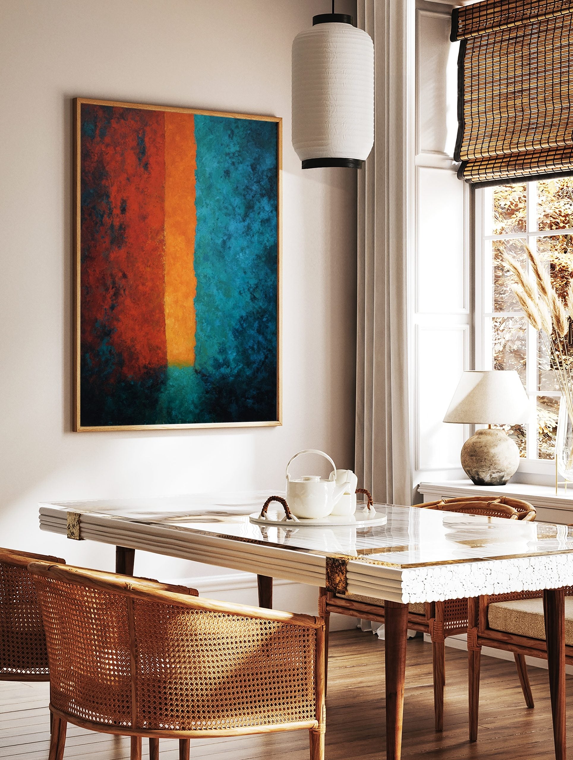 Textured abstract art print with three vertical bands in red, bright orange, and deep teal colours, in a styled room mockup