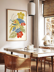 Abstract illustrative print of a yellow crab with blue claws and antennae, surrounded by yellow, in a styled room mockup