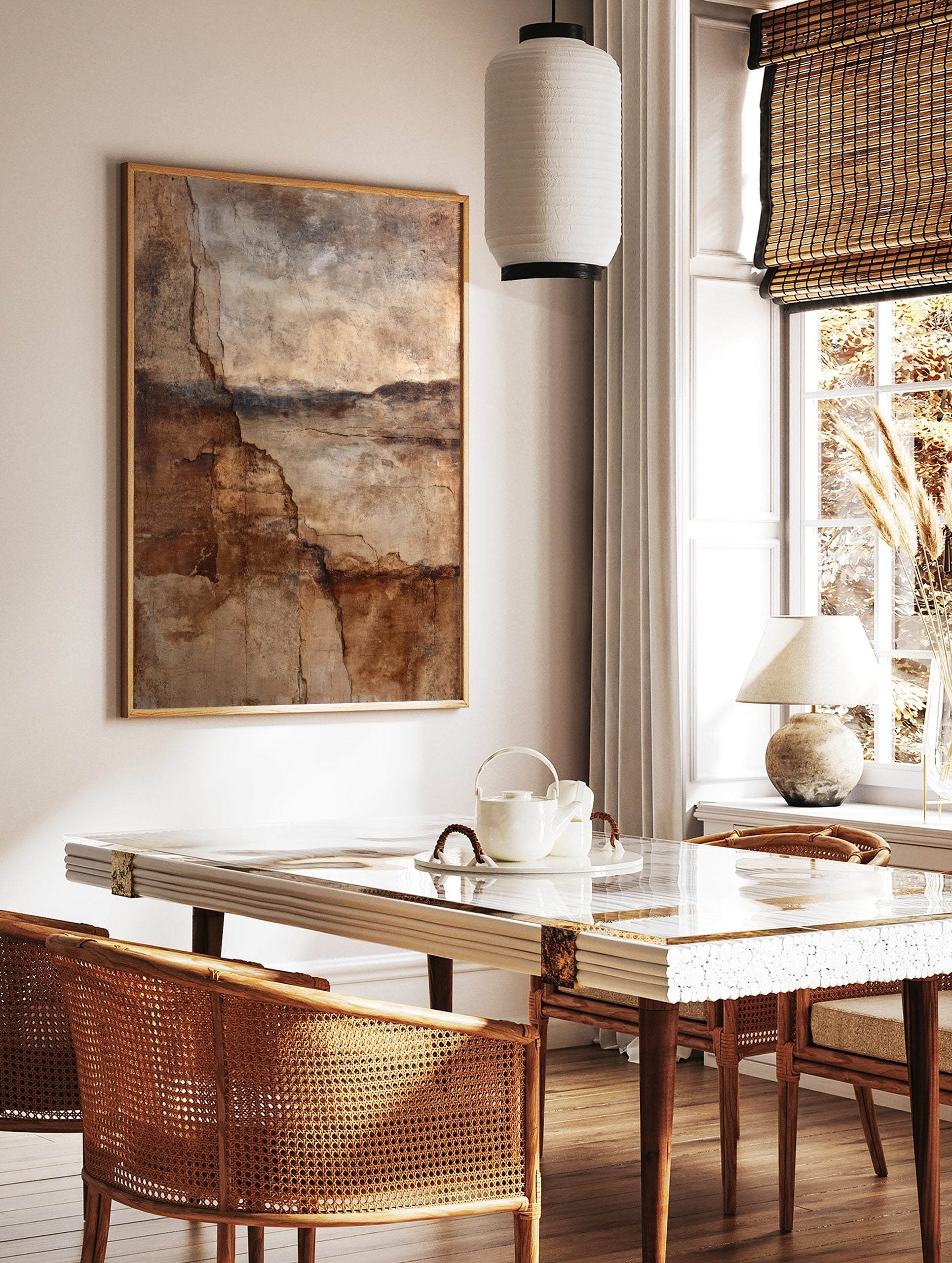 Abstract wall art print with deep cracks and layered textures in brown, beige, and dark earth tones, in a styled room mockup