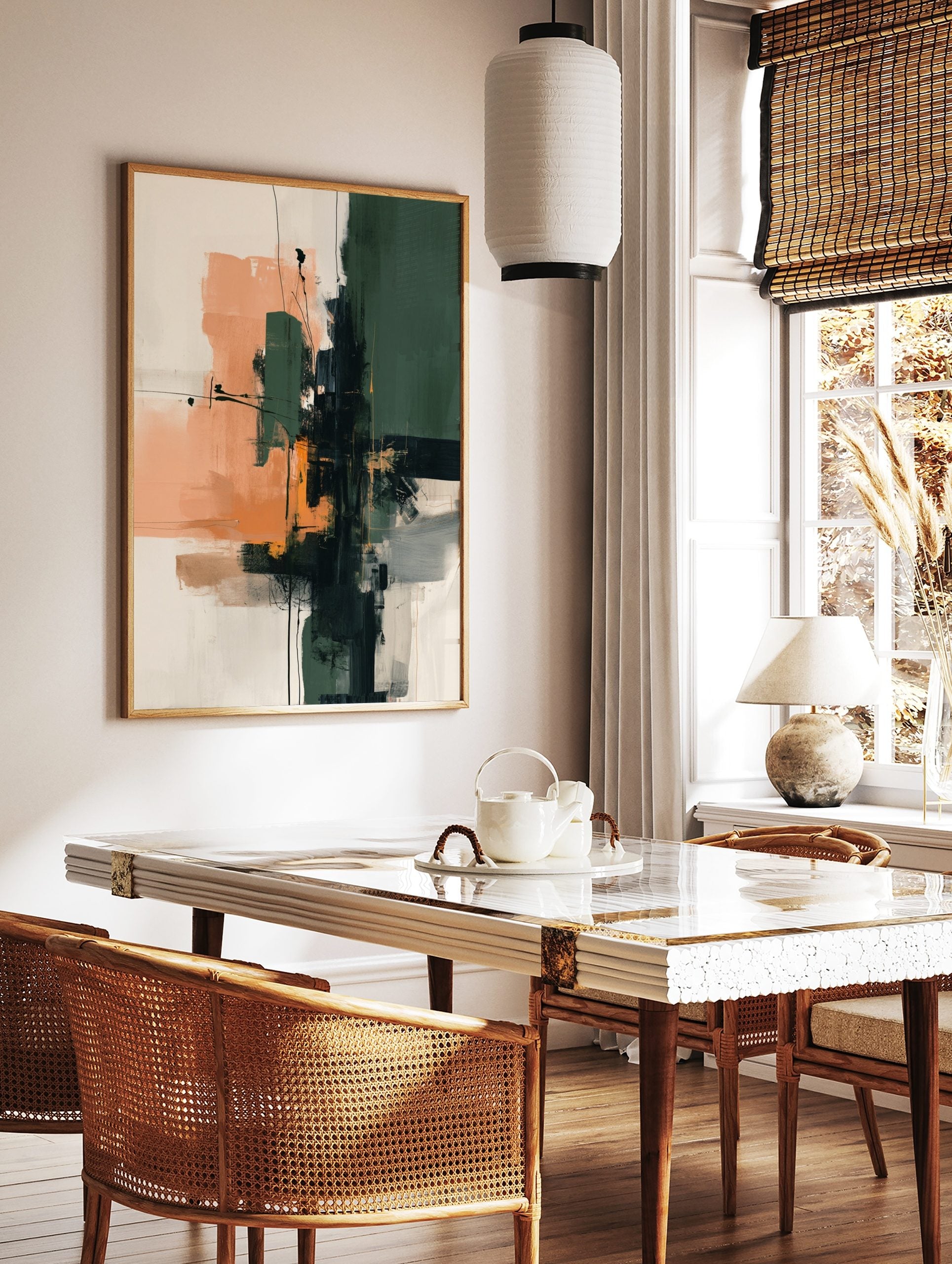 Abstract art print with dark green, peach, and black brushstrokes and lines on a light background, in a styled room mockup
