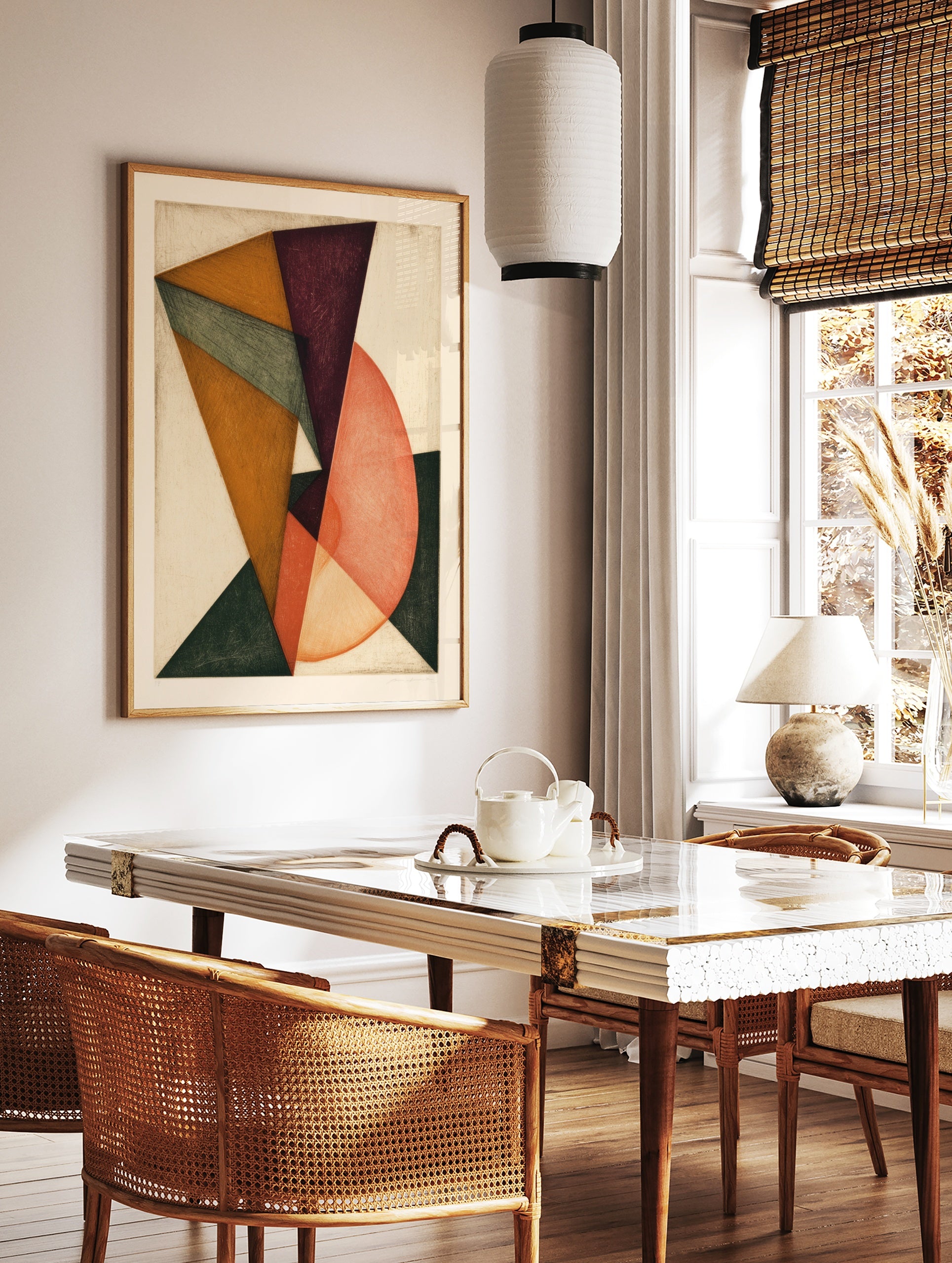Abstract geometric wall art with overlapping triangles and circular shapes in purple, orange, and, in a styled room mockup